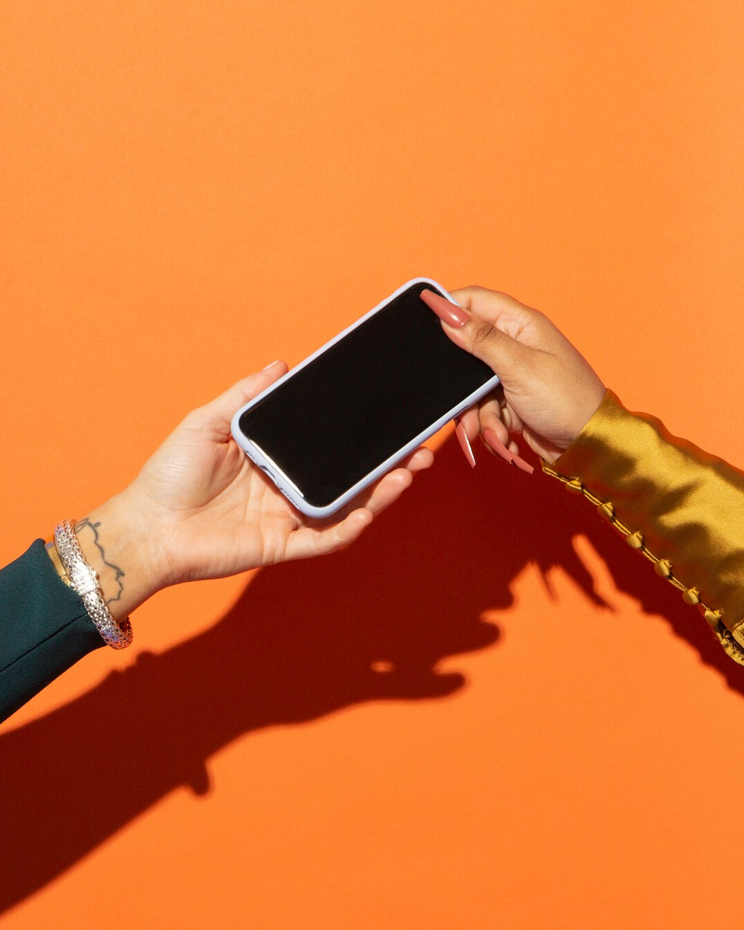 hands holding smartphone