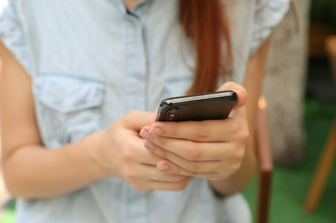 person checking phone